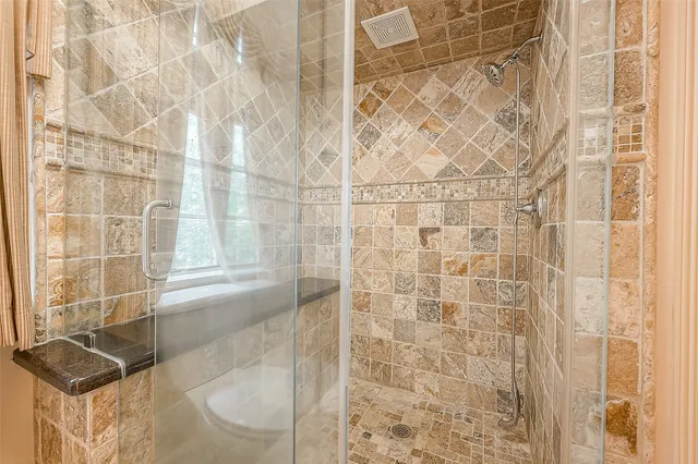 a bathroom with a sink toilet and vanity
