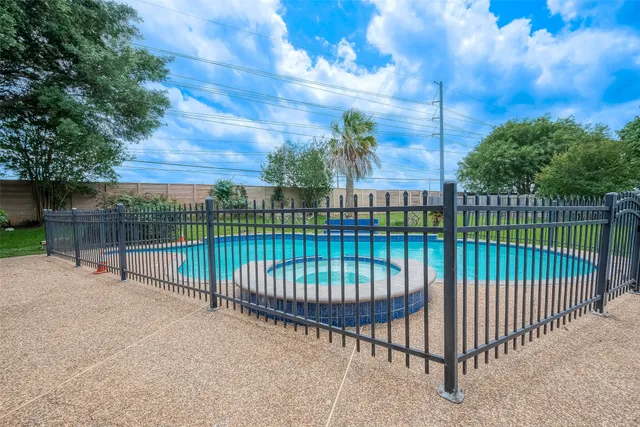 a view of backyard with a garden and plants