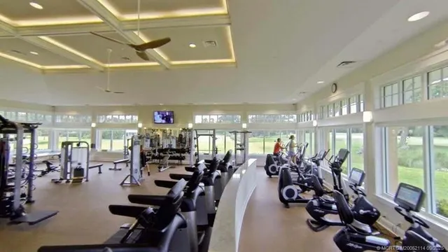 a room with lots of gym equipment