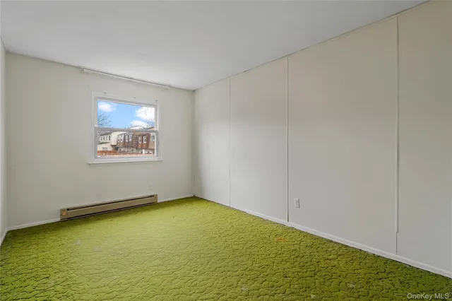 a view of an empty room with window