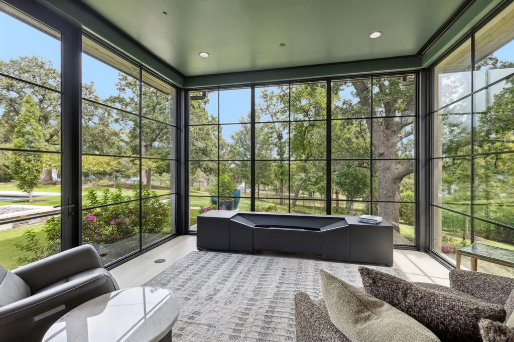 1502 Bluffview Drive Roanoke, TX 76262 - Photo 15 of 34 a living room with furniture and a large window