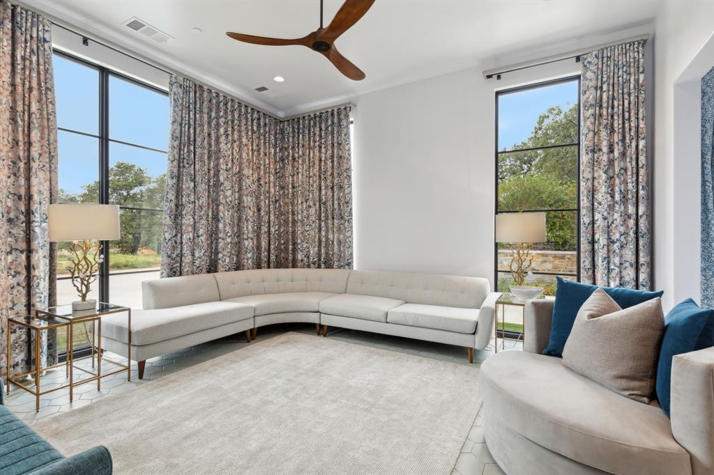 1502 Bluffview Drive Roanoke, TX 76262 - Photo 16 of 34 a living room with furniture and a large window