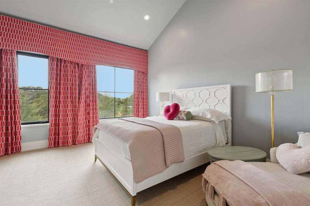 1502 Bluffview Drive Roanoke, TX 76262 - Photo 18 of 34 a bedroom with a bed and a window