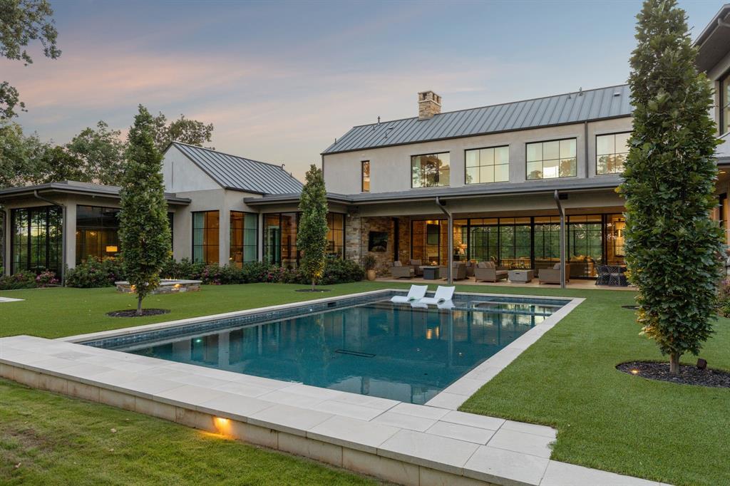 1502 Bluffview Drive Roanoke, TX 76262 - Photo 30 of 34 a view of a house with a swimming pool