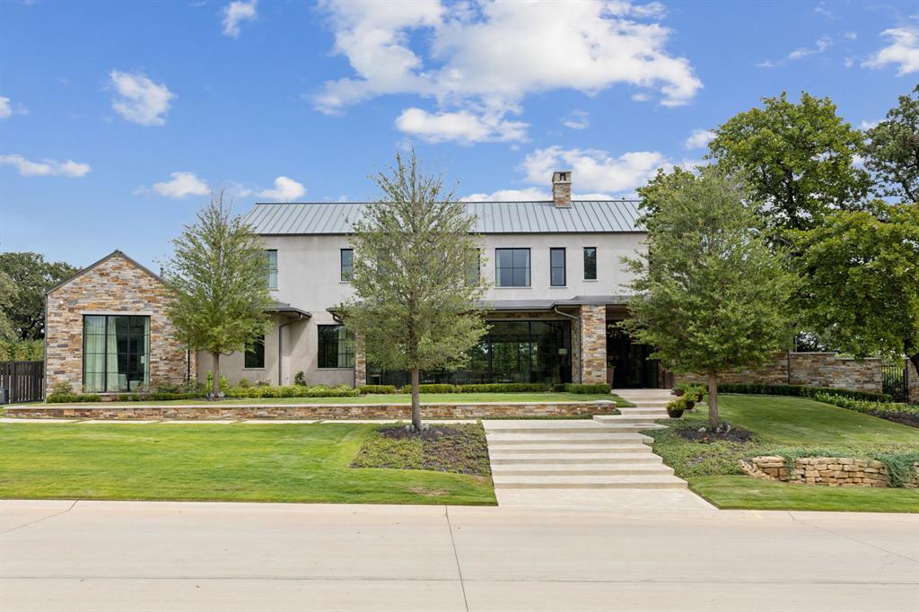 1502 Bluffview Drive Roanoke, TX 76262 - Photo 34 of 34 a view of a white house with a yard