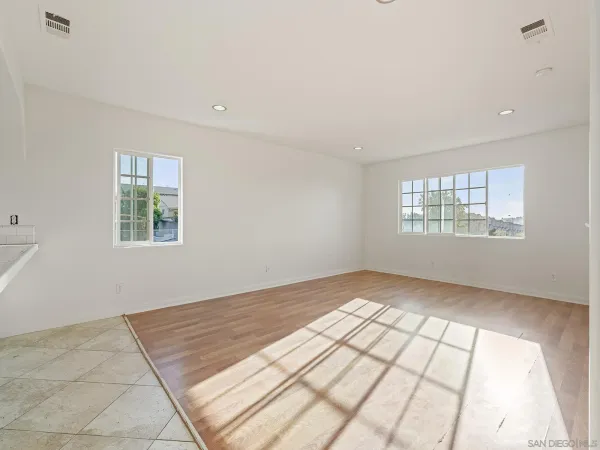 a view of an empty room and window
