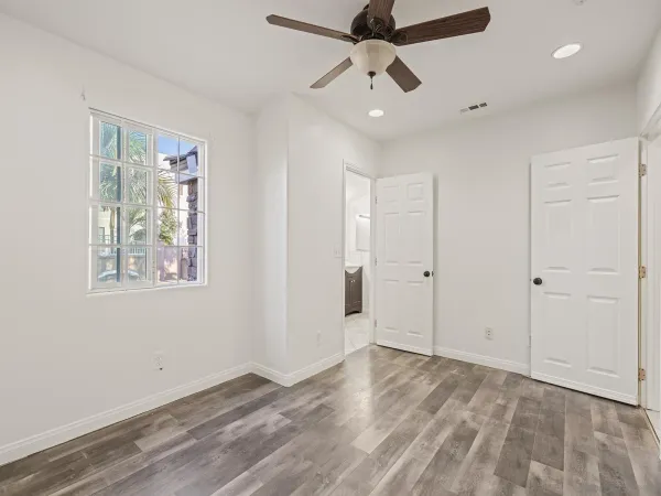 a view of an empty room with a window