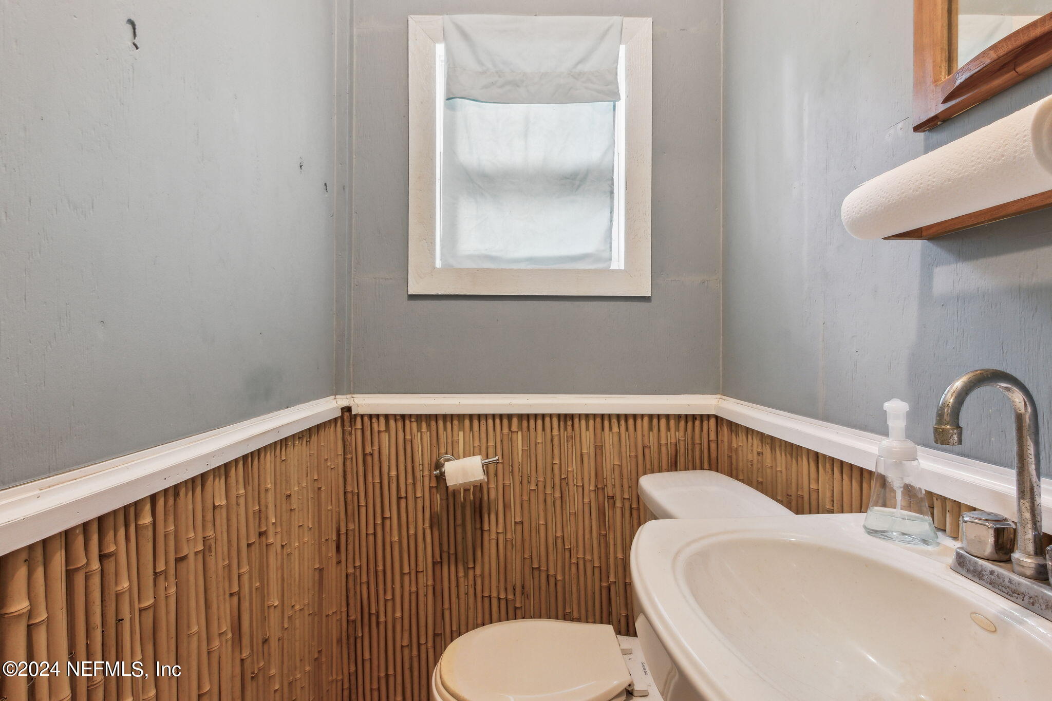 97125 Pirates Point Road Yulee, FL 32097 - Photo 47 of 90 a bathroom with a sink and a toilet