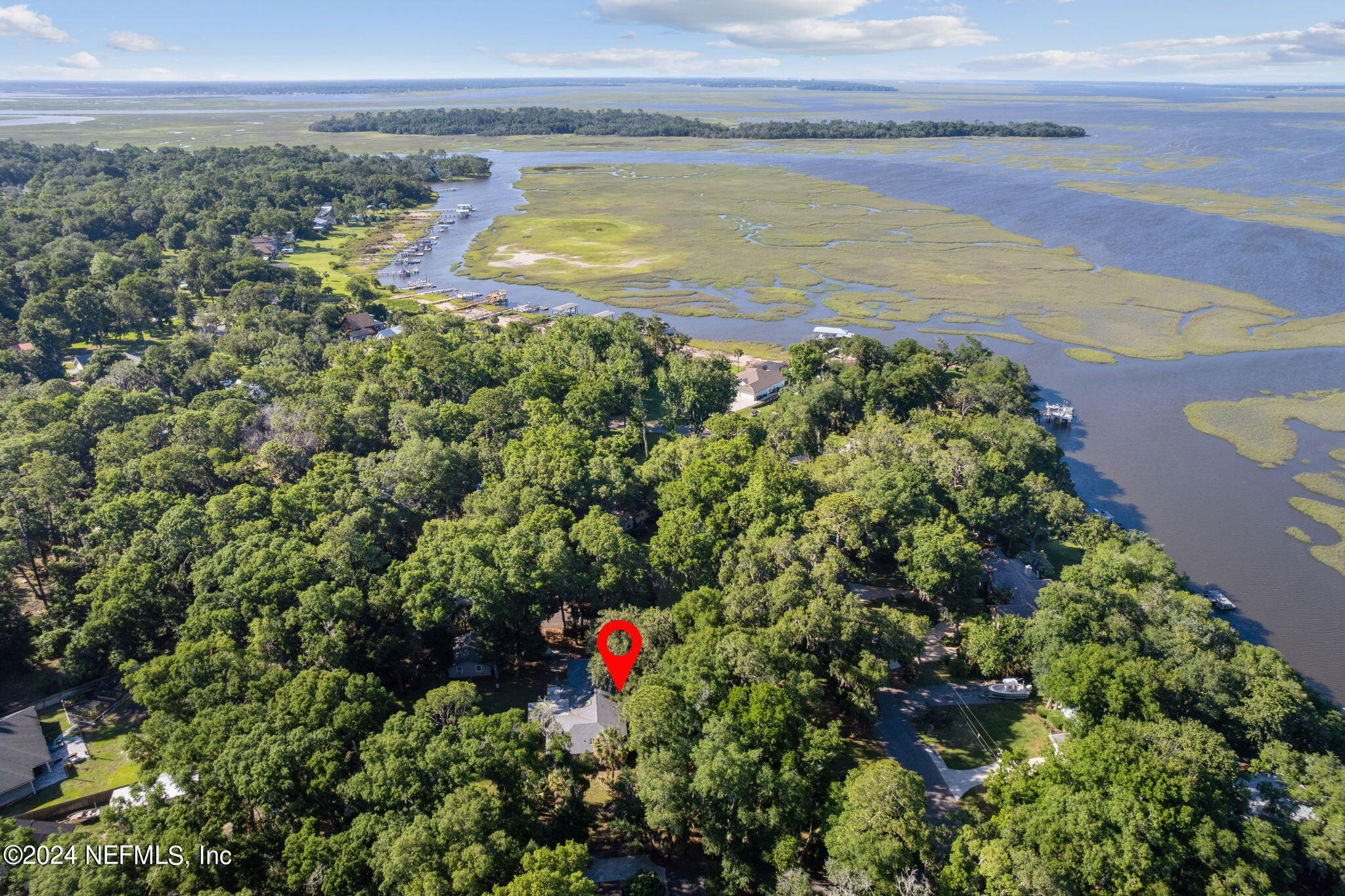 97125 Pirates Point Road Yulee, FL 32097 - Photo 7 of 90 a view of a lake with a mountain