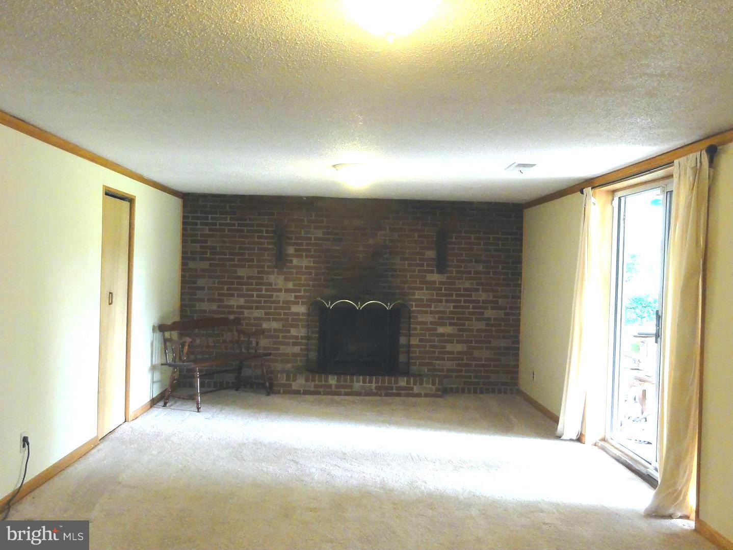 114 Thorden Road Reisterstown, MD 21136 - Photo 12 of 17 Large Family Room slider on right to the patio