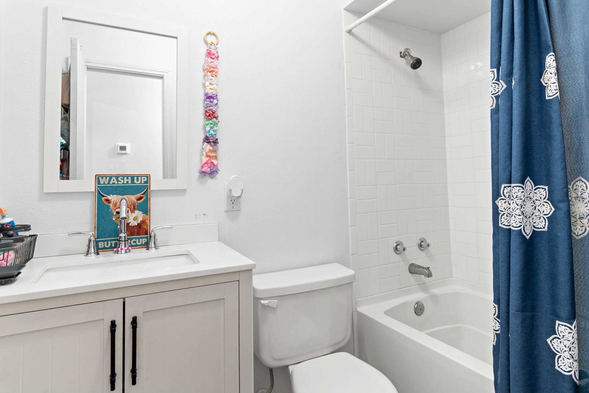 9994 Ruby Lane Silsbee, TX 77656 - Photo 14 of 17 a bathroom with a sink toilet and shower