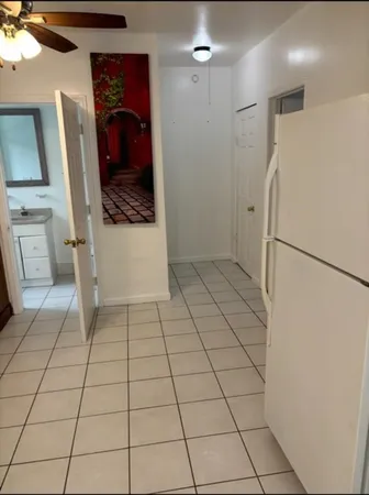 a utility room with cabinets