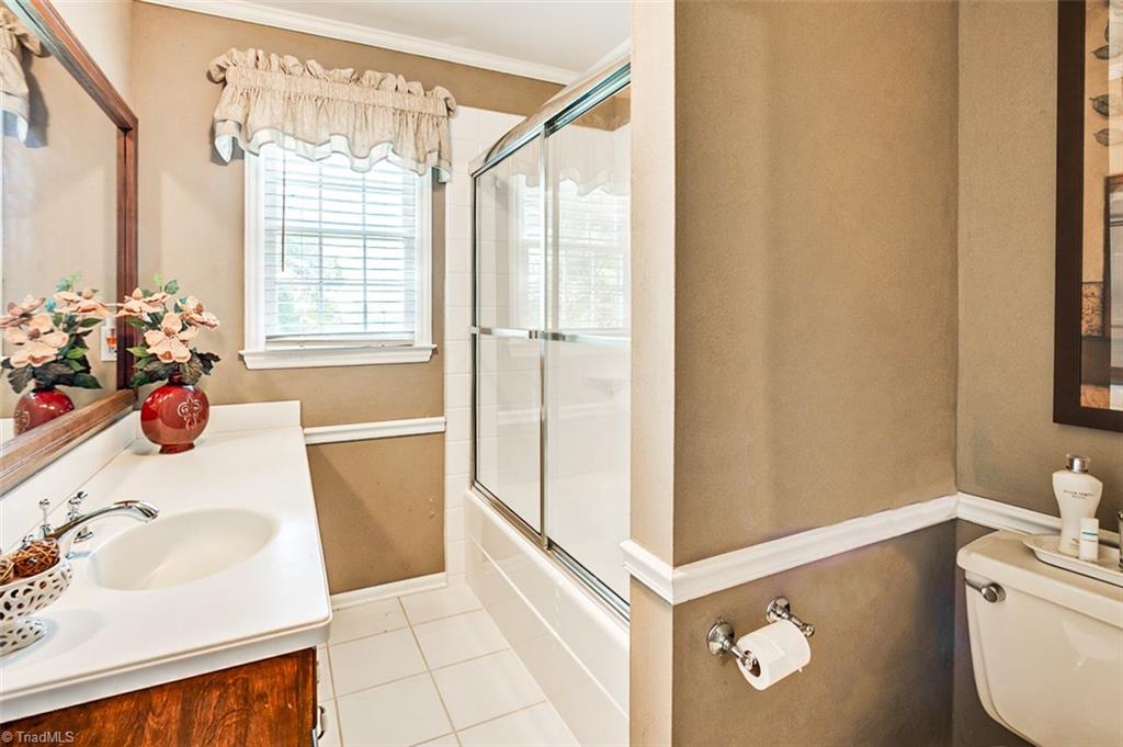 1174 Pleasant Ridge Road Ramseur, NC 27316 - Photo 21 of 38 Hall bath, tub & shower