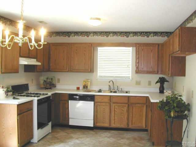 1053 Mills Street Raleigh, NC 27608 - Photo 6 of 10 Spacious Kitchen / Oak Cabinets / Gas Stove Other