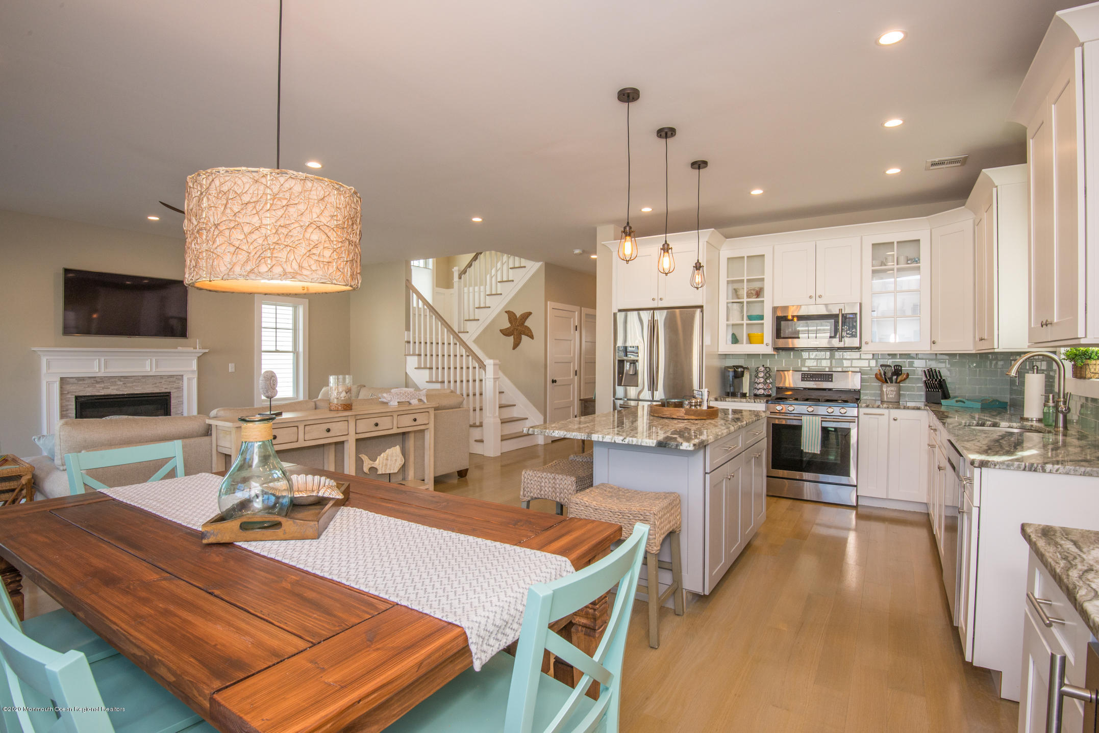 210 Johnson Road Lavallette, NJ 08735 - Photo 20 of 48 a large kitchen with a table and chairs