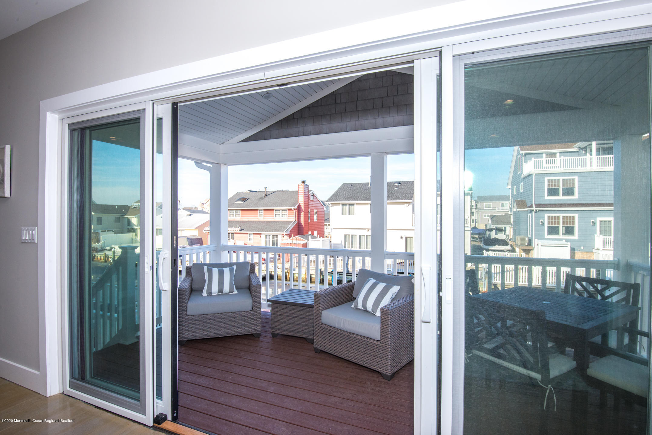 210 Johnson Road Lavallette, NJ 08735 - Photo 23 of 48 a balcony view with a couch and table