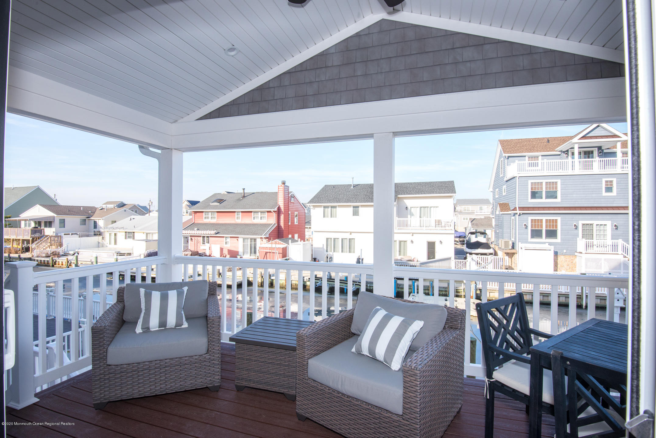 210 Johnson Road Lavallette, NJ 08735 - Photo 24 of 48 a living room with furniture and a floor to ceiling window