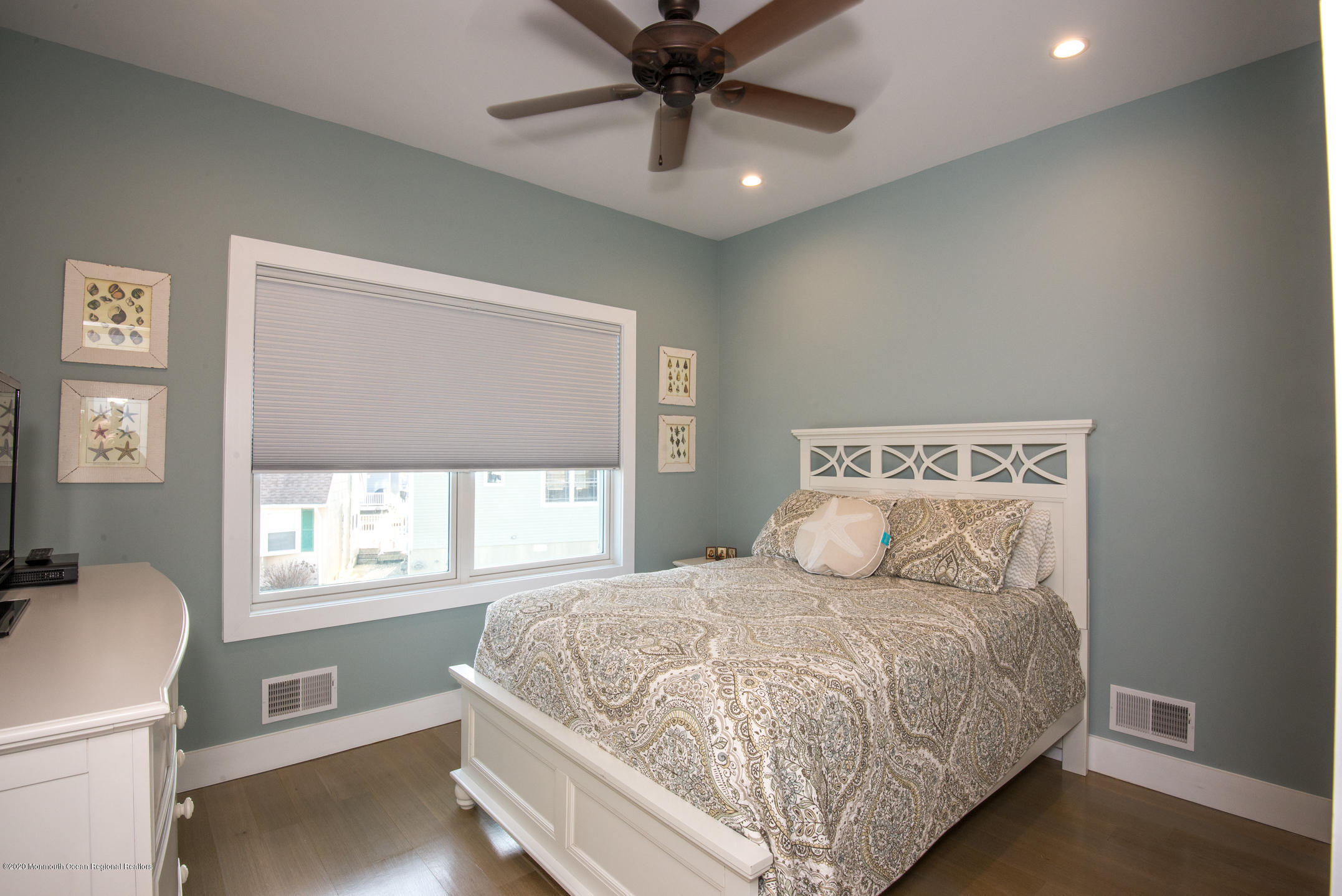 210 Johnson Road Lavallette, NJ 08735 - Photo 26 of 48 a bedroom with a large bed and a window