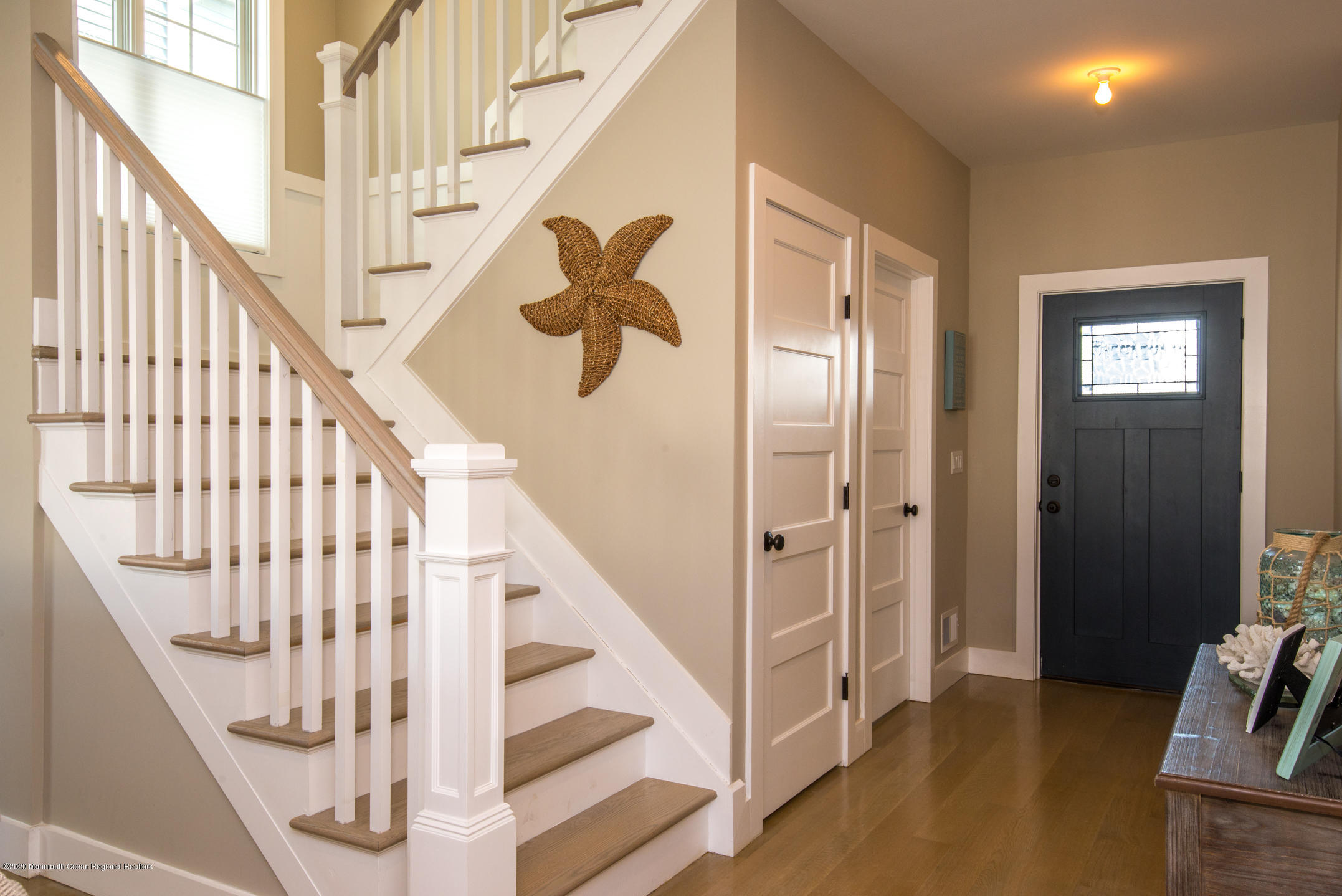 210 Johnson Road Lavallette, NJ 08735 - Photo 27 of 48 a view of front door with stairs and wooden floor