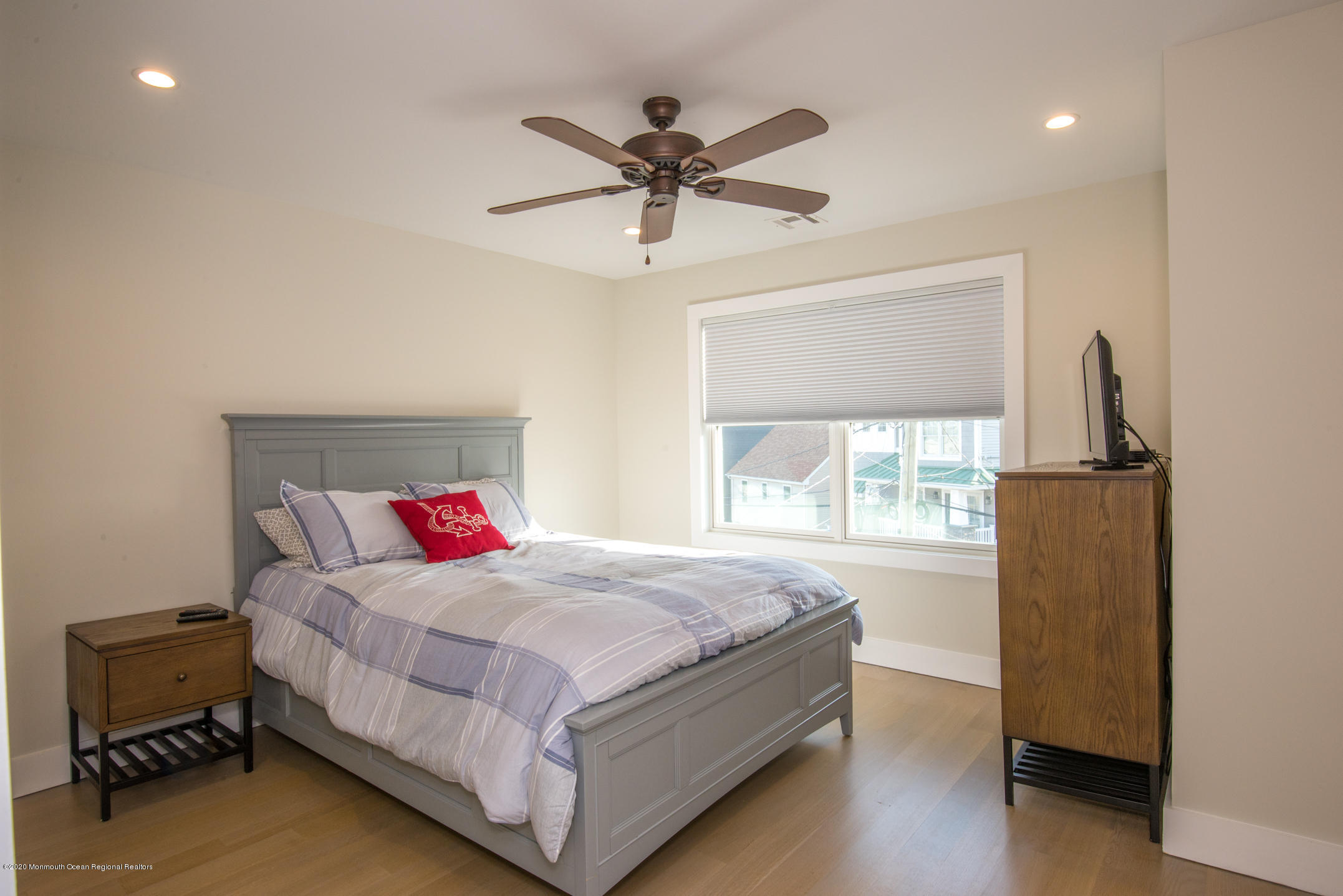 210 Johnson Road Lavallette, NJ 08735 - Photo 28 of 48 a bedroom with a bed and window