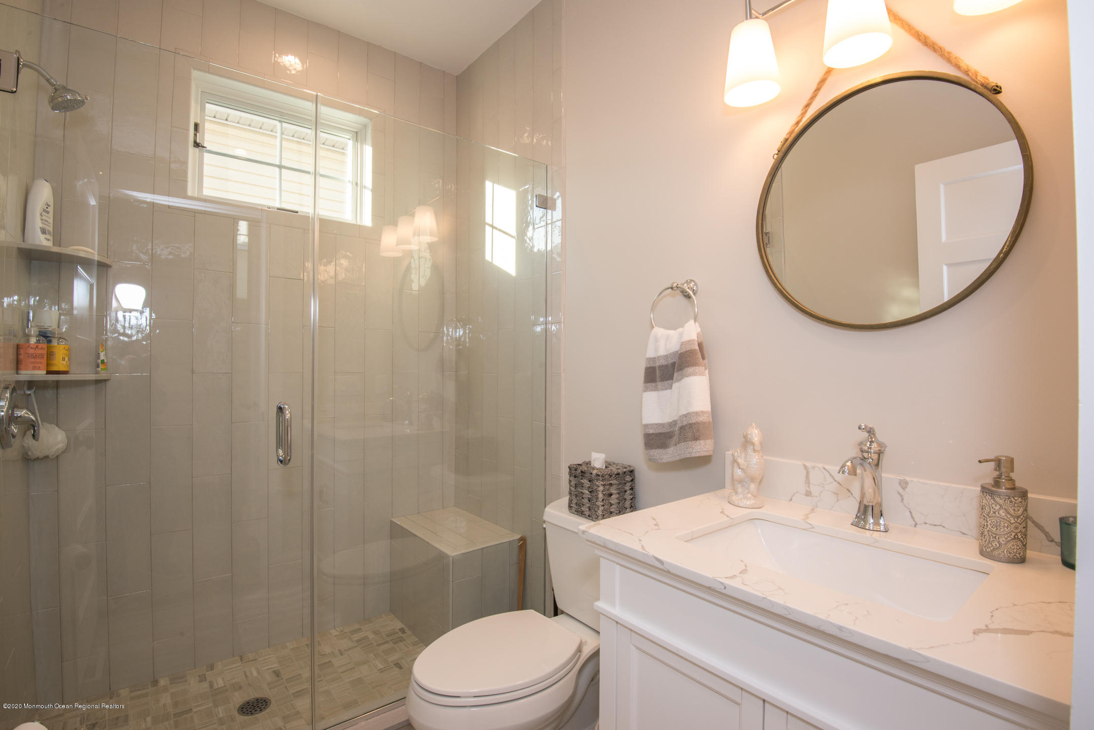 210 Johnson Road Lavallette, NJ 08735 - Photo 42 of 48 a bathroom with a sink a toilet and a mirror