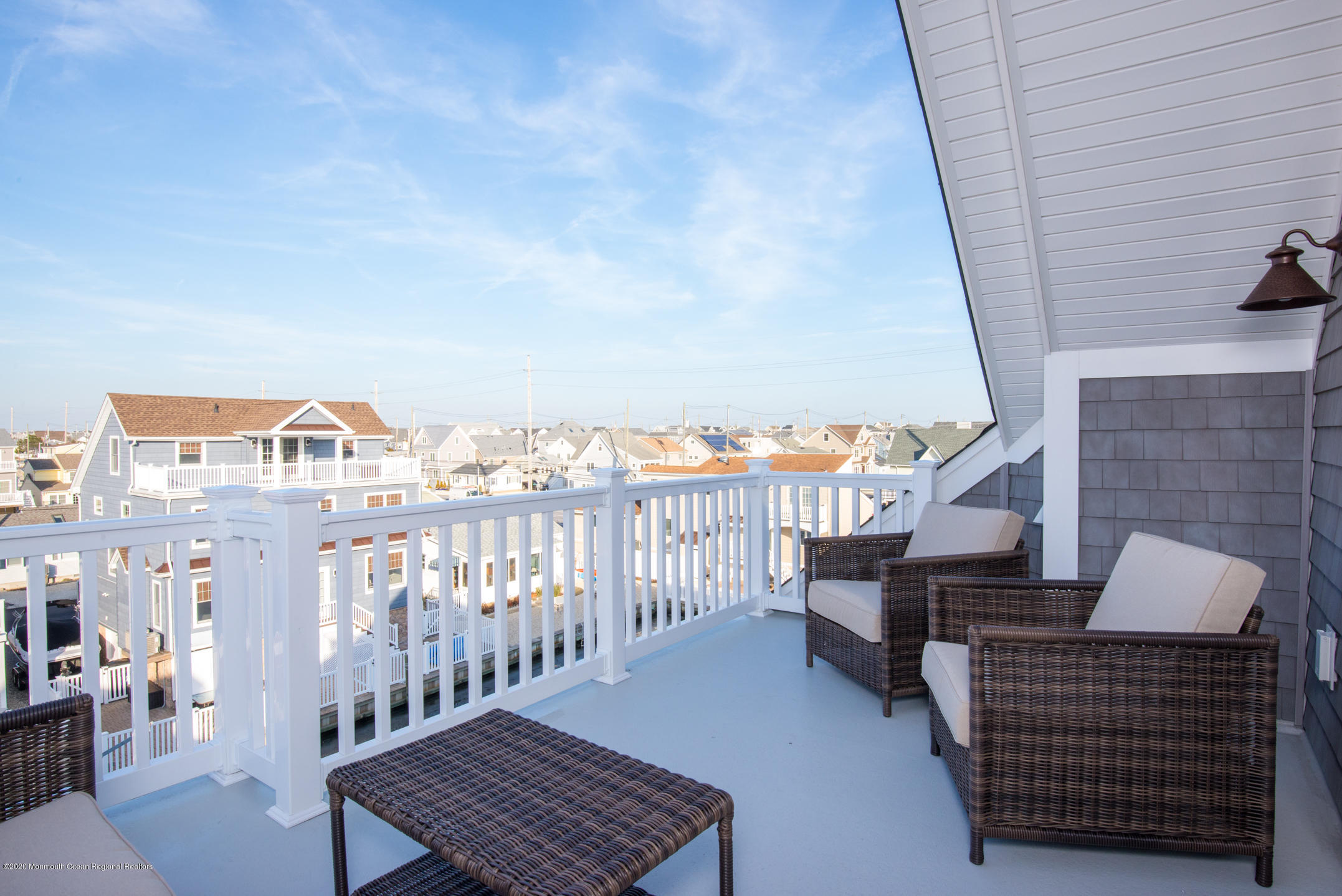 210 Johnson Road Lavallette, NJ 08735 - Photo 45 of 48 a view of a balcony with chairs
