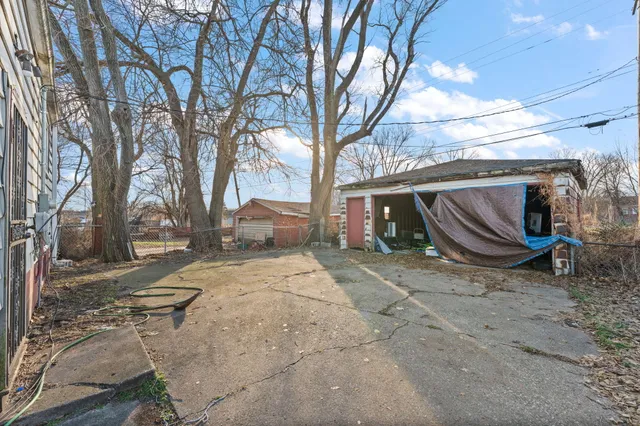 a view of a house with a snow in the yard