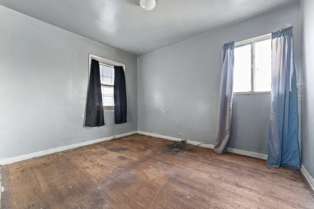 an empty room with windows