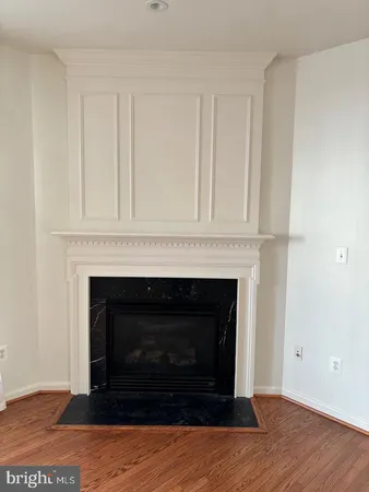 a living room with a fireplace