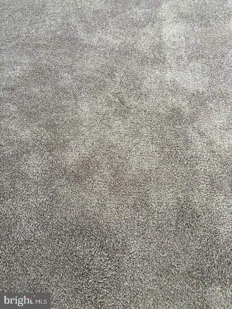 a close up of a white marble wall