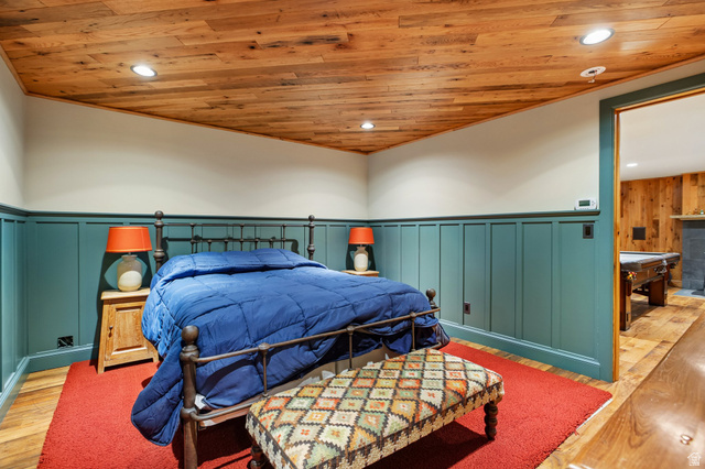 10205 East Moose Loop Road Salt Lake City, UT 84121 - Photo 32 of 50 Room featuring wood-finish ceiling, recessed lighting, and wall paneling