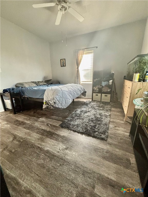 1754 West Big Elm Road Troy, TX 76579 - Photo 13 of 31 a bedroom with a bed and glass table