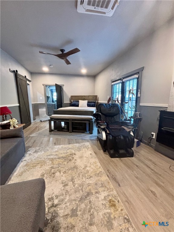 1754 West Big Elm Road Troy, TX 76579 - Photo 18 of 31 a living room with furniture gym equipment and a large window