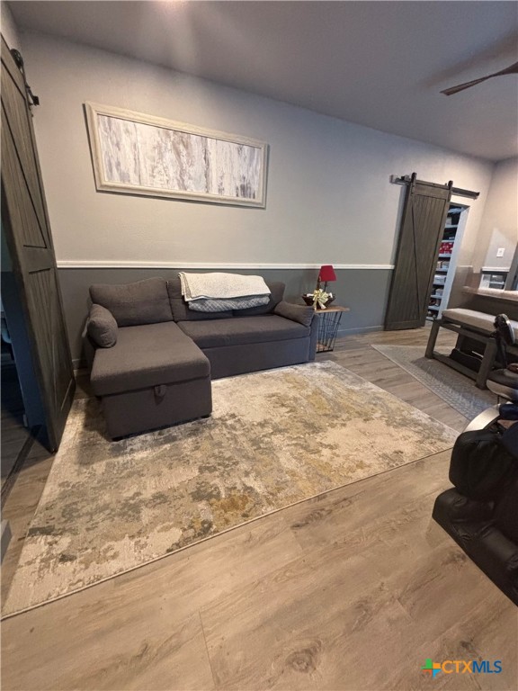 1754 West Big Elm Road Troy, TX 76579 - Photo 20 of 31 a view of a livingroom with furniture and a flat screen tv