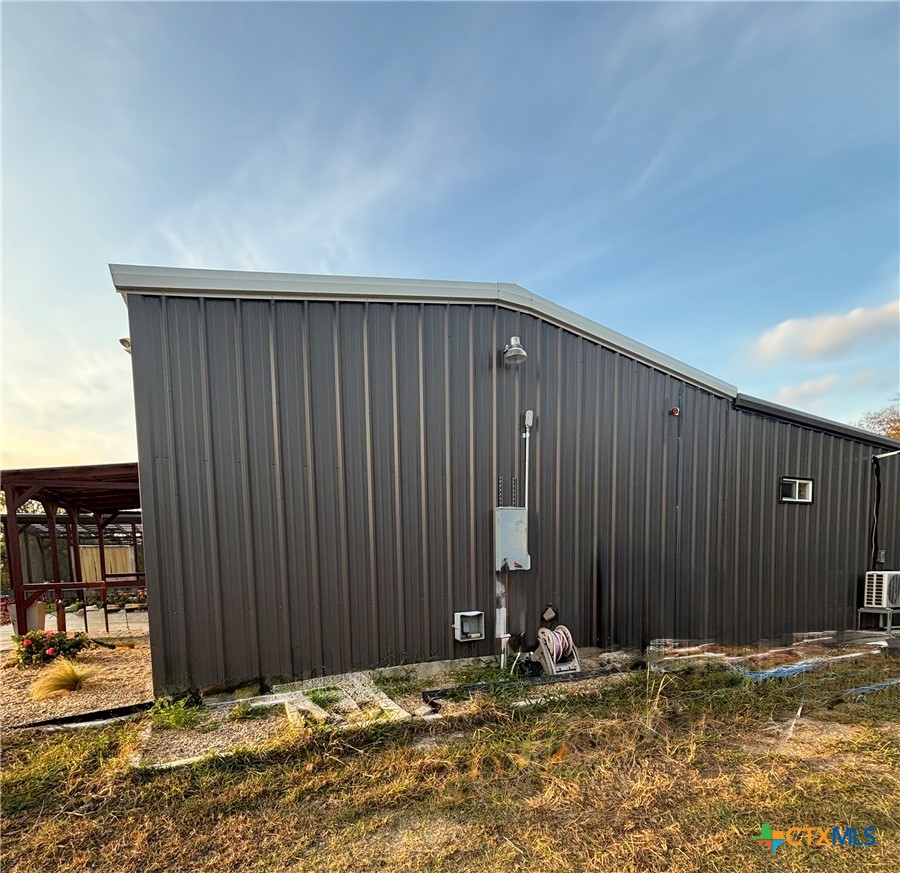 1754 West Big Elm Road Troy, TX 76579 - Photo 31 of 31 a view of wooden floor and a building in the background