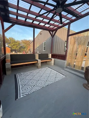 a utility room with closet dryer and washer