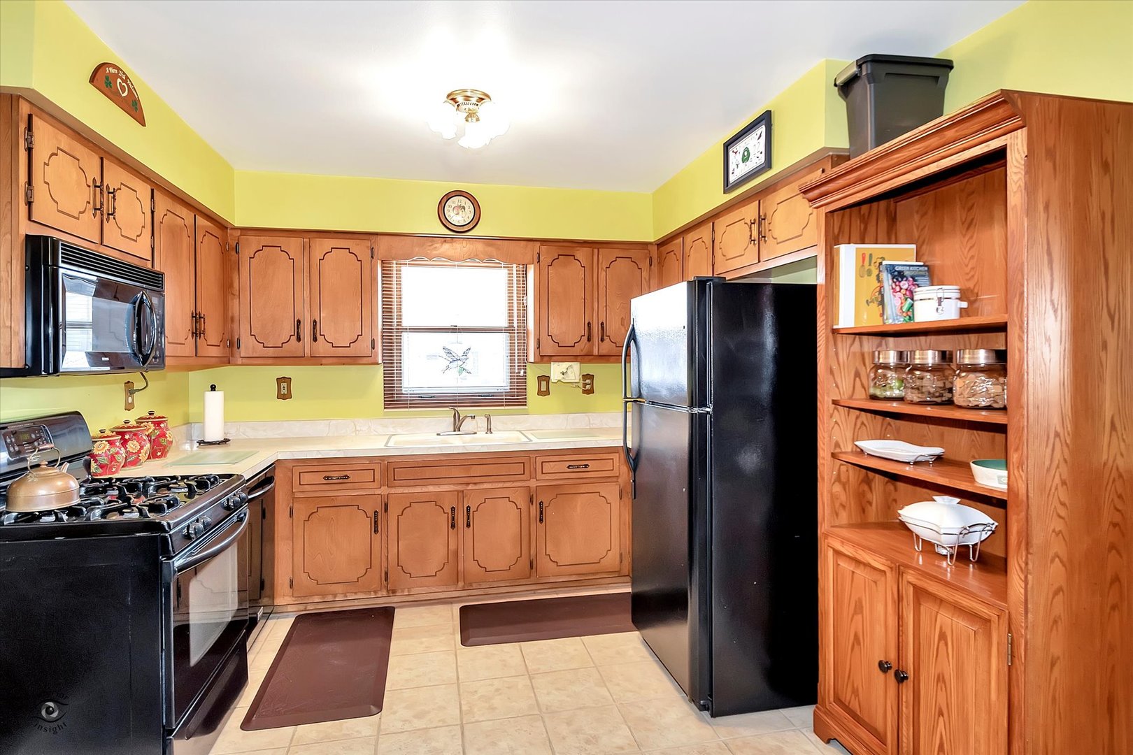 1011 Schoolgate Road New Lenox, IL 60451 - Photo 6 of 25 a kitchen with stainless steel appliances granite countertop a refrigerator and a stove top oven
