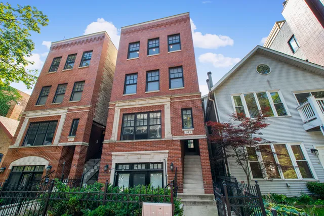 a front view of multi story residential apartment building