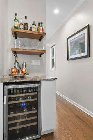 a stove top oven sitting inside of a kitchen