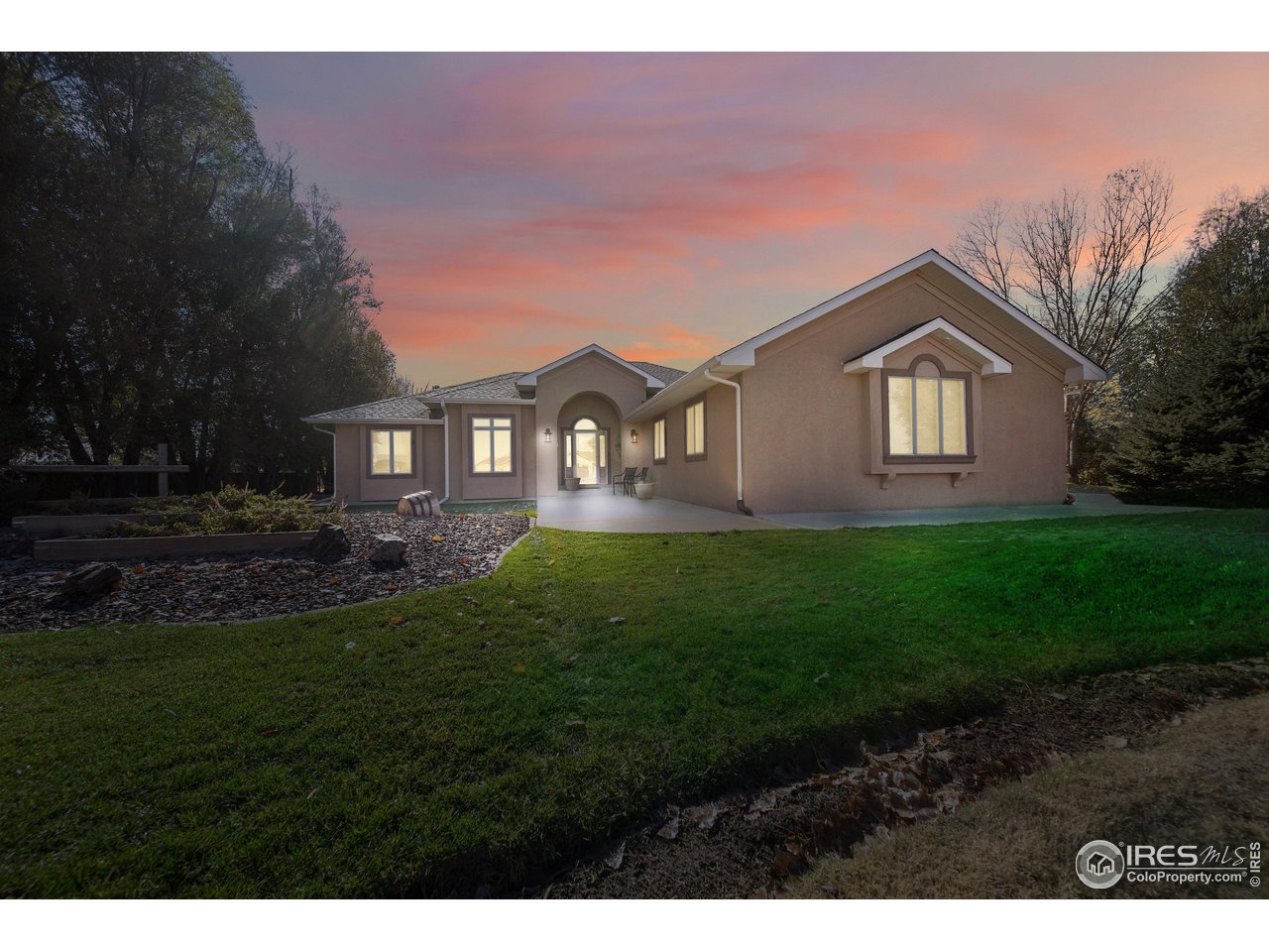 17680 County Rd Q.8 Fort Morgan, CO 80701 - Photo 2 of 40 a house view with a garden space