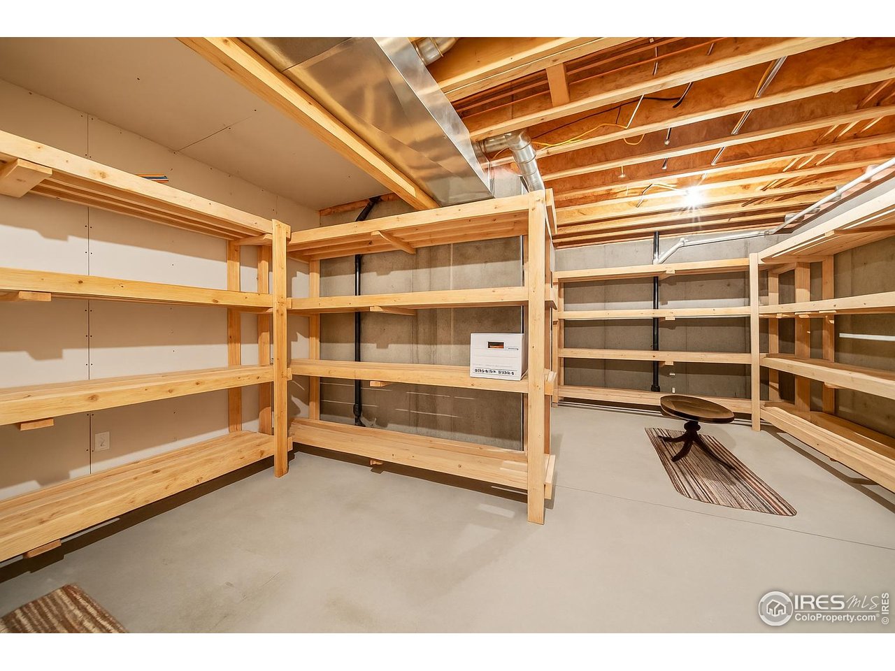 17680 County Rd Q.8 Fort Morgan, CO 80701 - Photo 23 of 40 a view of an empty room with empty shelves