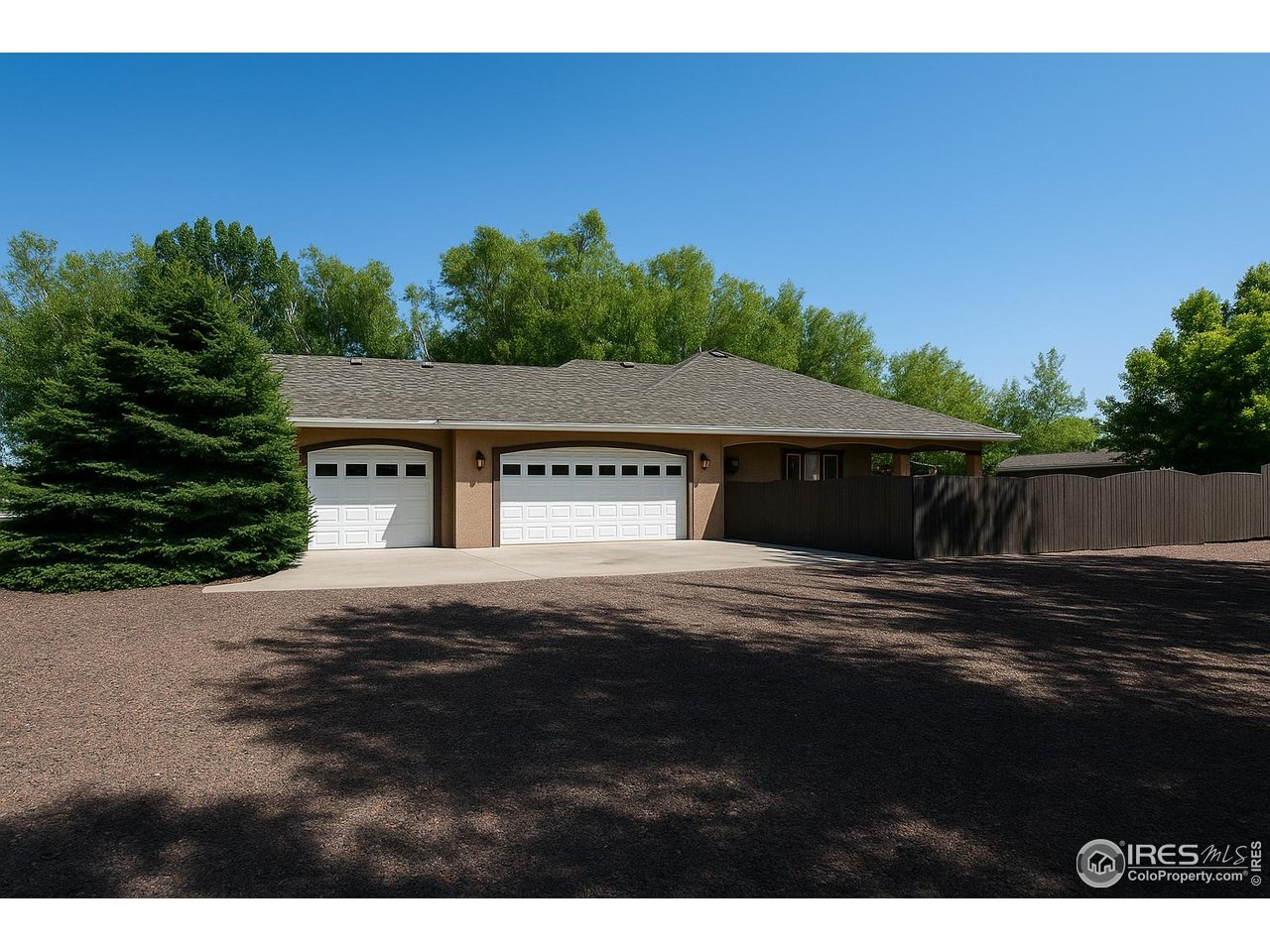 17680 County Rd Q.8 Fort Morgan, CO 80701 - Photo 25 of 40 a front view of a house with a yard