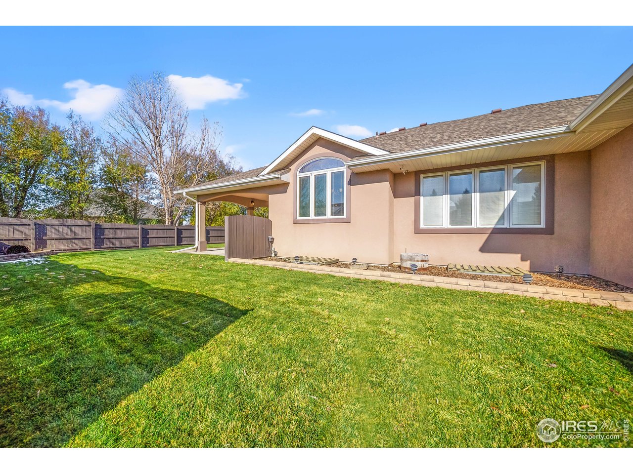 17680 County Rd Q.8 Fort Morgan, CO 80701 - Photo 27 of 40 a front view of a house with garden