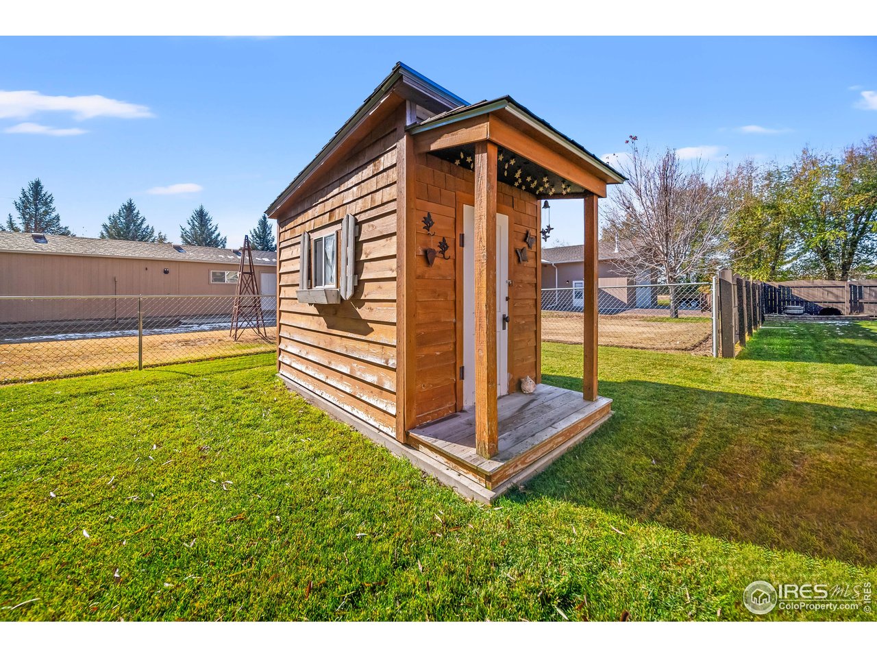 17680 County Rd Q.8 Fort Morgan, CO 80701 - Photo 28 of 40 a front view of a house with a yard