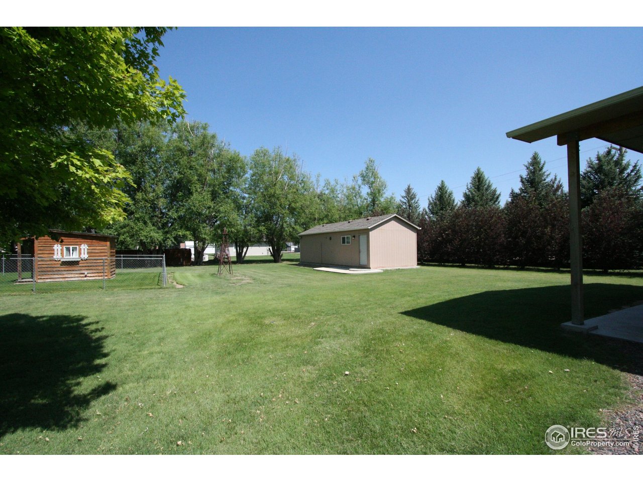 17680 County Rd Q.8 Fort Morgan, CO 80701 - Photo 30 of 40 a front view of a house with a yard