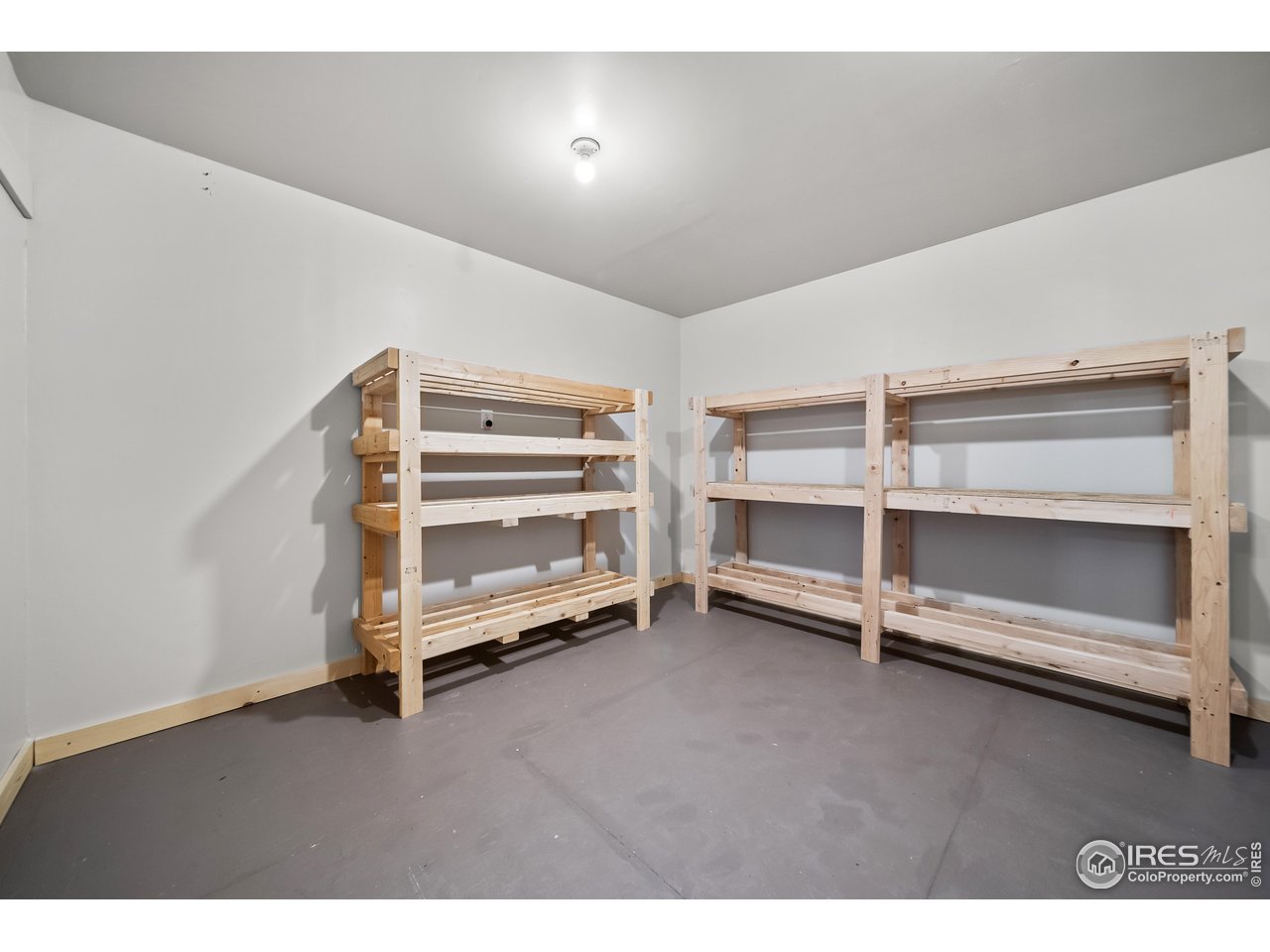 17680 County Rd Q.8 Fort Morgan, CO 80701 - Photo 32 of 40 a view of an empty room with a fireplace