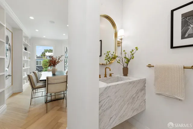 a kitchen with stove and cabinets