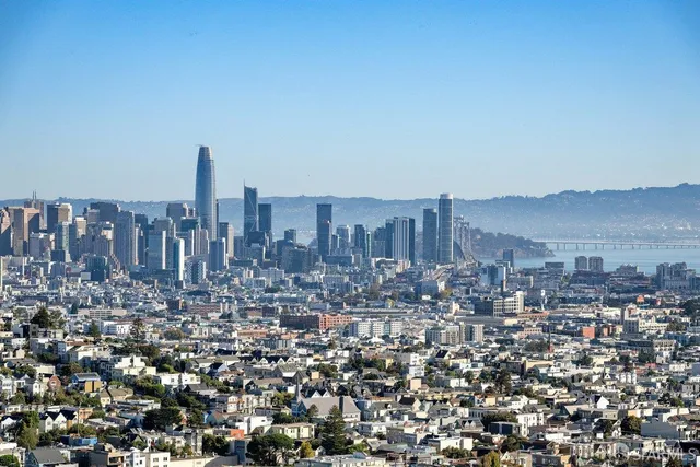 a kitchen with a sink a stove and cabinets