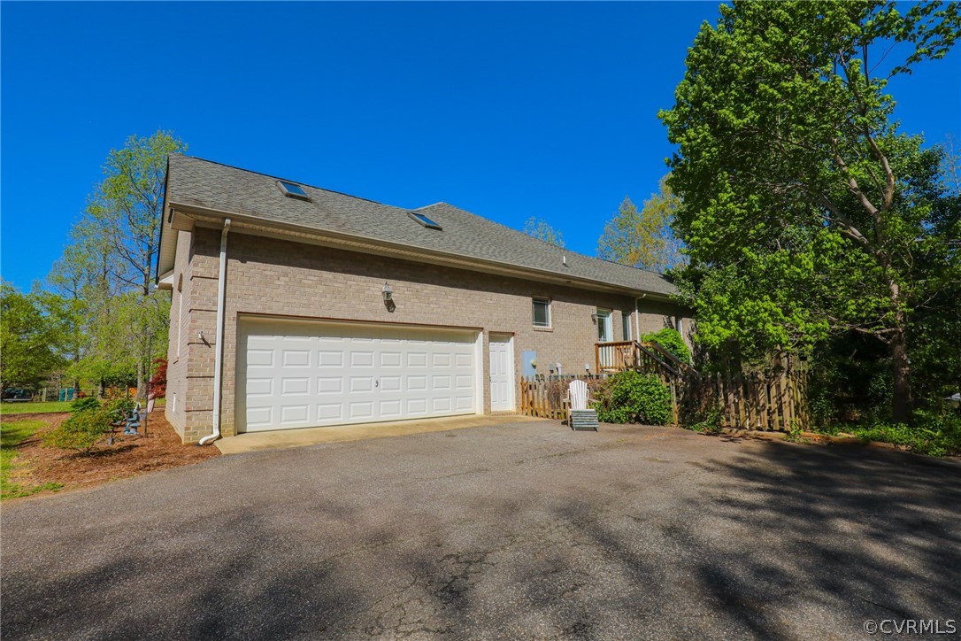 11708 Winterpock Road Chesterfield, VA 23838 - Photo 42 of 50 a view of a house with a garage