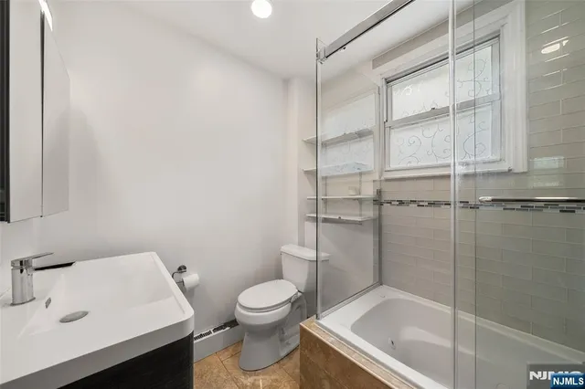 a bathroom with a sink and a toilet